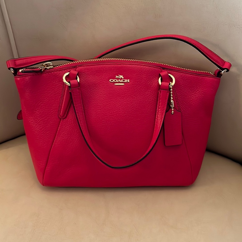 Coach leather mini tote with gold hardware.